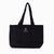 Bolso Laghu de Sukha Argentina en color negro, con diseño elegante y detalles de cuero, ideal para llevar en ocasiones especiales.