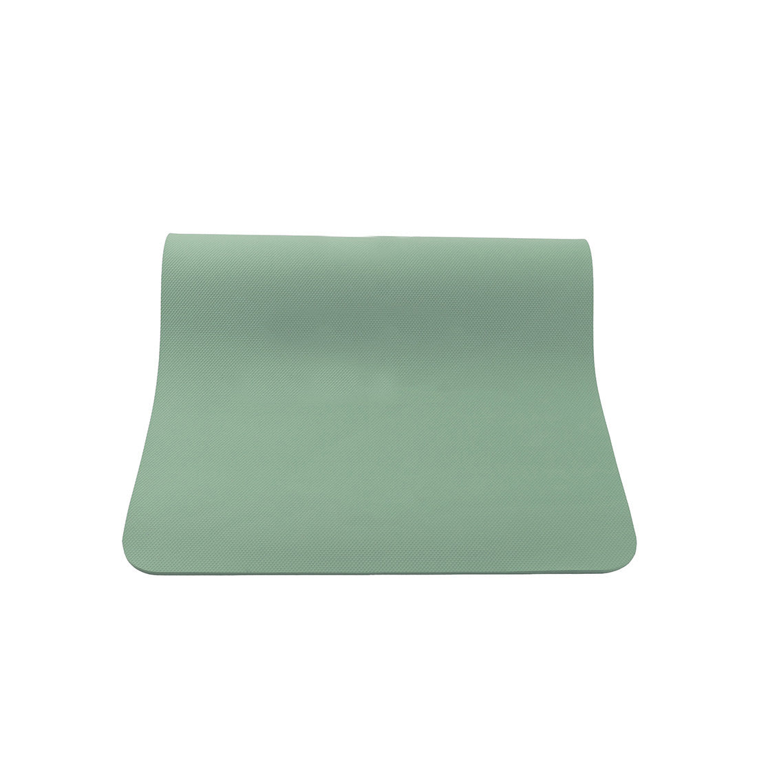 Alfombrilla de yoga Línea Aprendiz Lisa en verde de Sukha Argentina, vista desde arriba sobre superficie blanca.