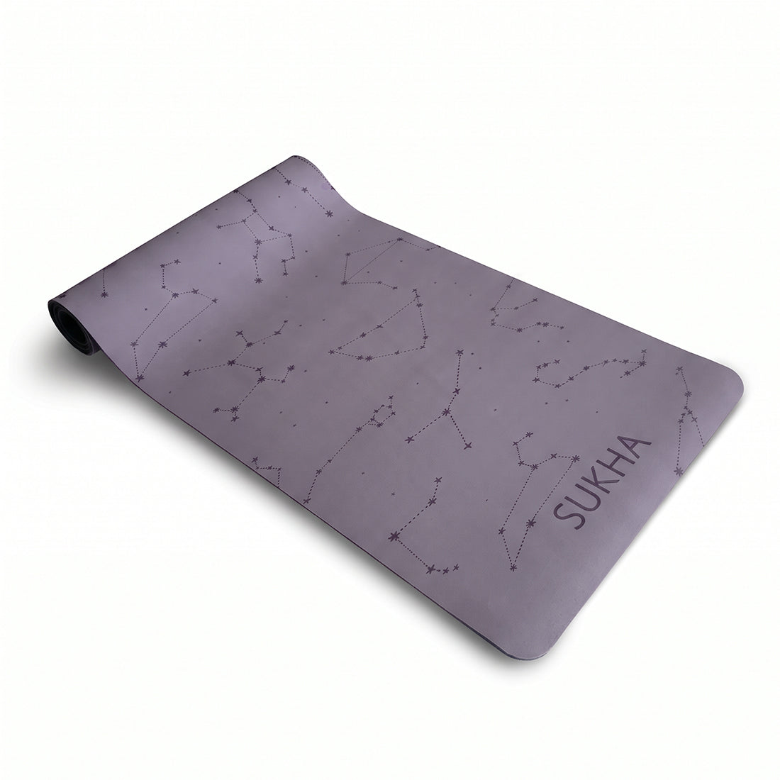 Estera de yoga superior de 5mm con diseño de puntos en color lila, marca Sukha Argentina, sobre superficie lisa y antideslizante.