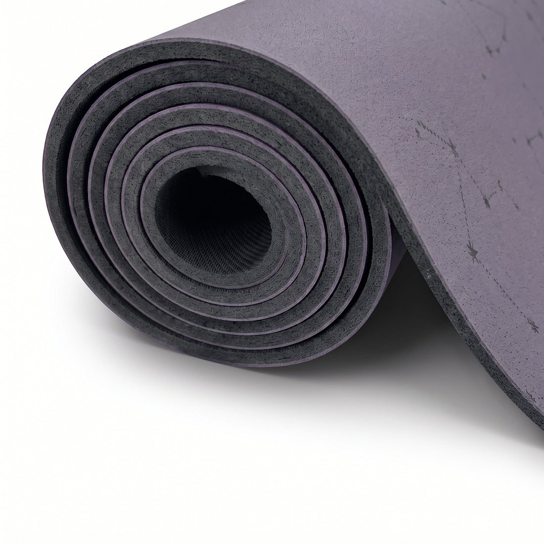 Esterilla de yoga superior DOT de 5mm de Sukha Argentina con diseño en color lila y patrón de puntos en la superficie.