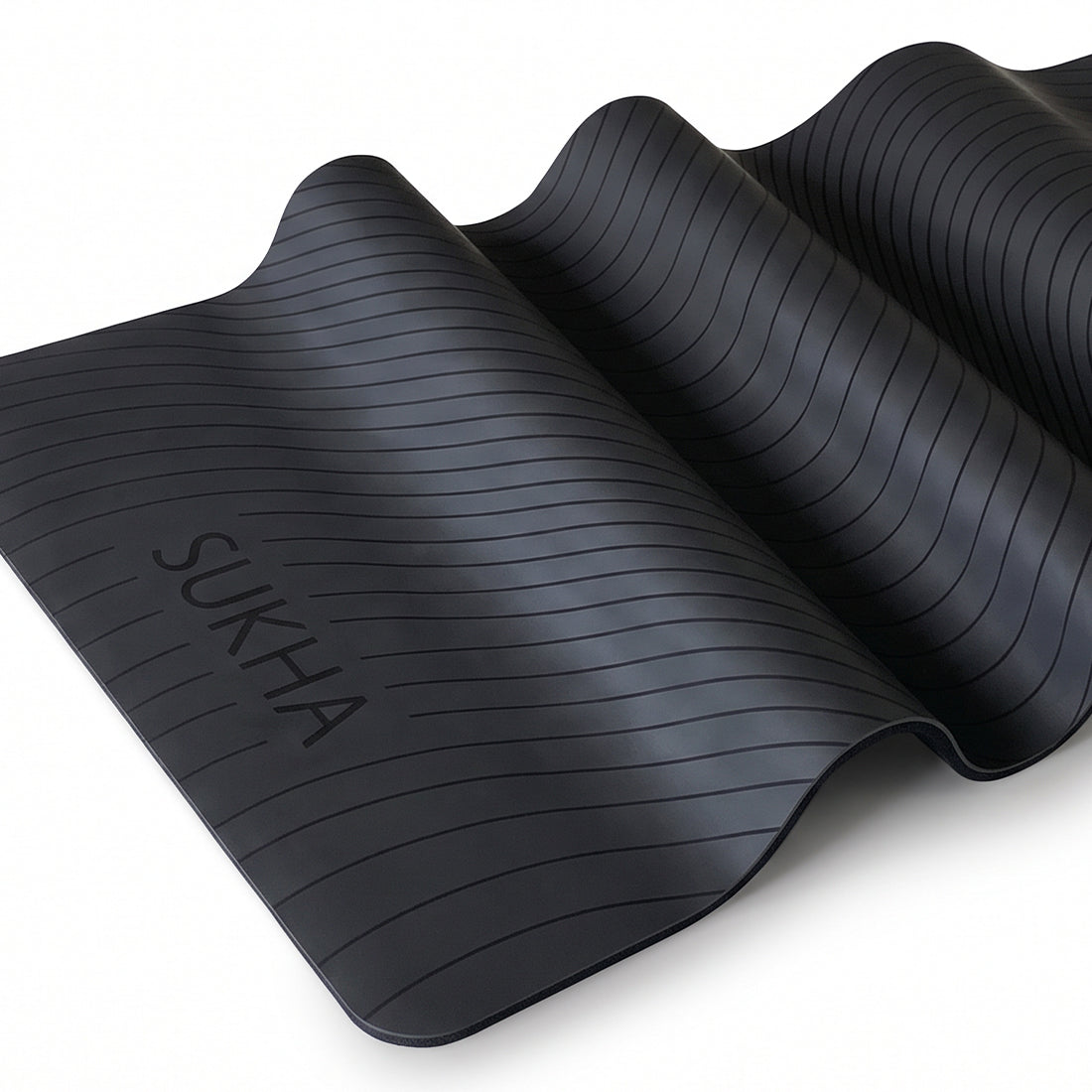 Estera de yoga superior DOT de 5 mm de Sukha Argentina en color negro, con diseño de puntos para mayor agarre y comodidad.
