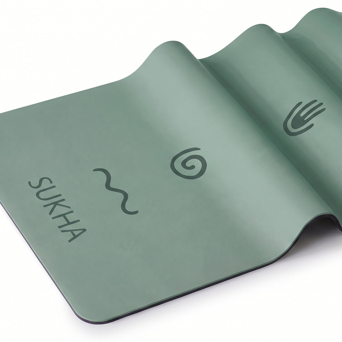 Alfombra de yoga superior DOT de 5mm de Sukha Argentina en color verde con puntos, ideal para prácticas de yoga y ejercicios.