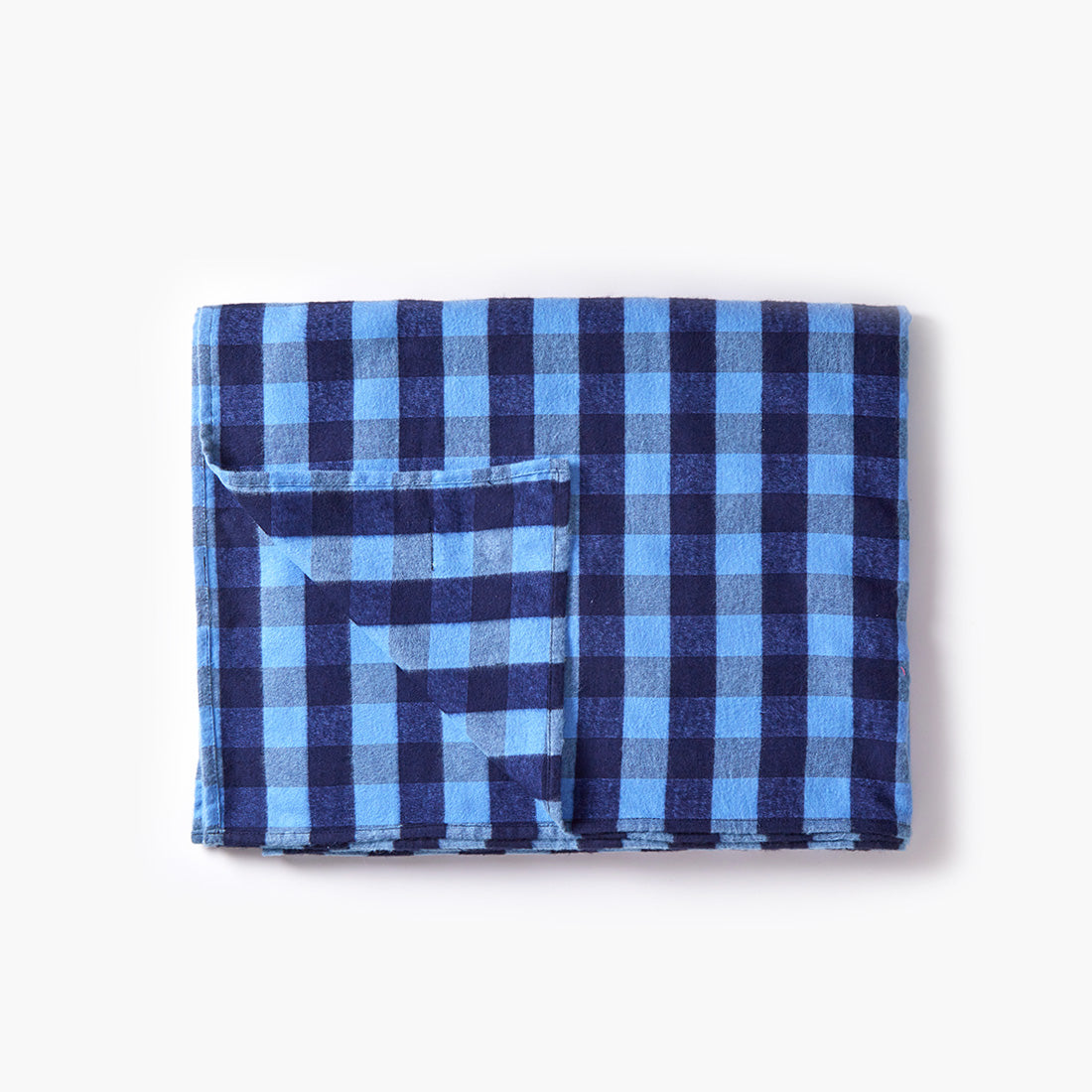 Set de 6 mantas cuadrille azul de Sukha Argentina, con patrón clásico y textura suave.