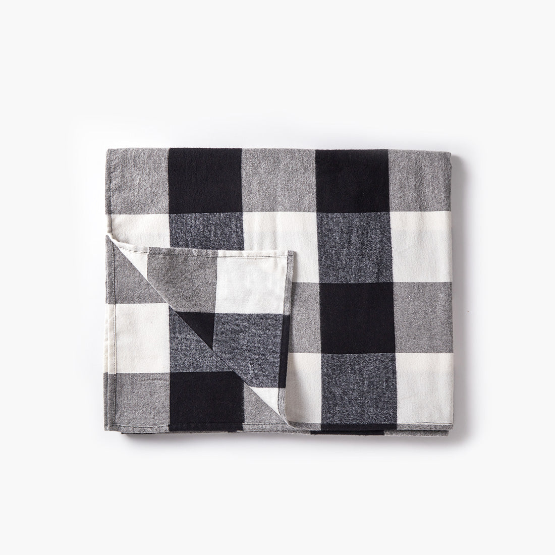 Juego de 6 mantas cuadrille negras de Sukha Argentina, suaves y cómodas, ideal para decoración y uso en el hogar.