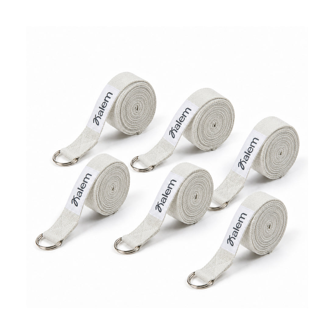 Set de 6 cintos de 2m de la marca Sukha Argentina sobre una mesa de trabajo, con diseño resistente y duradero.