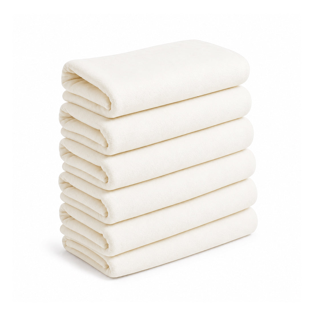 Manta polar Sukha Argentina en colores variados, apiladas en una mesa de trabajo para uso en exteriores o interiores.