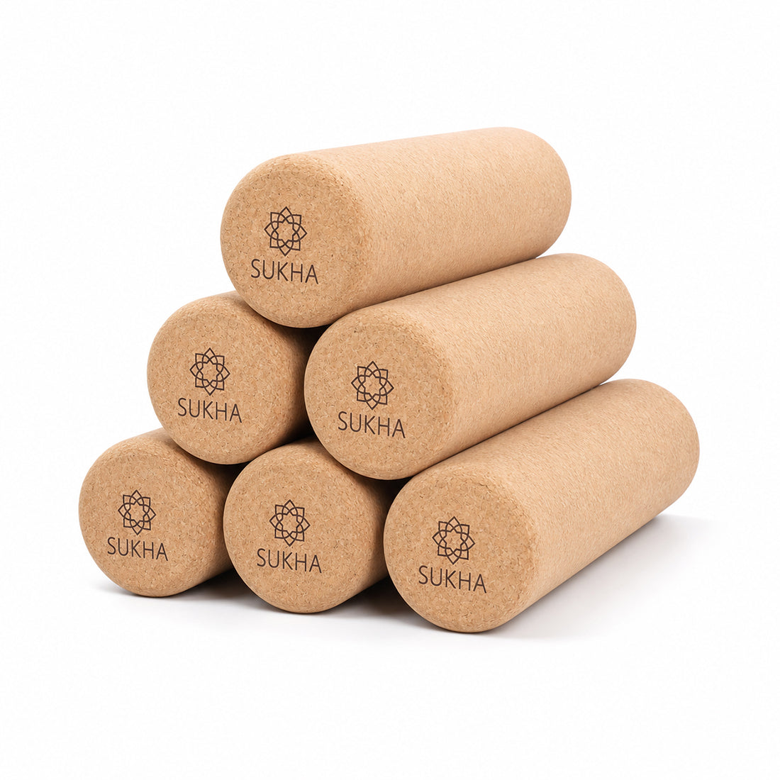 Conjunto de 6 rollers de corcho Sukha Argentina en una mesa de trabajo, ideales para manualidades y proyectos creativos.