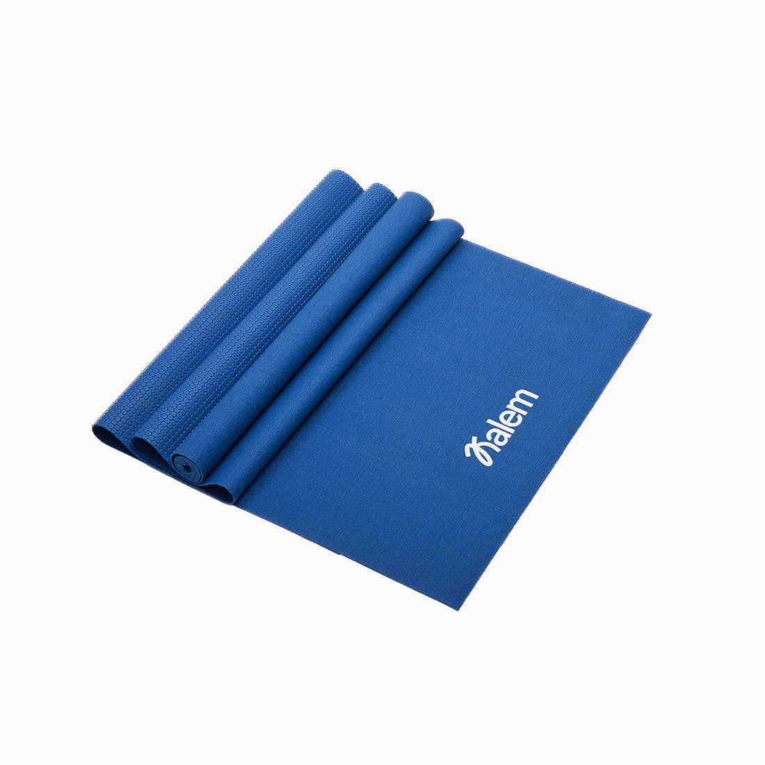 Conjunto de 6 mats plegables de 2mm de grosor Kalem de Sukha Argentina sobre una mesa de trabajo.