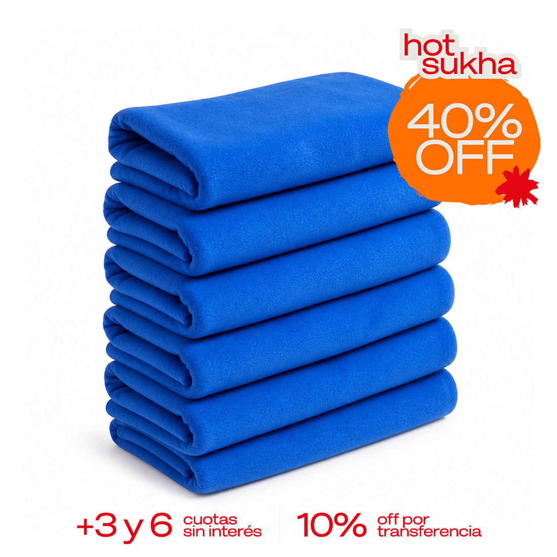 Seis mantas polar Sukha Argentina en diferentes colores, apiladas en una mesa de trabajo para uso en exteriores o hogar.