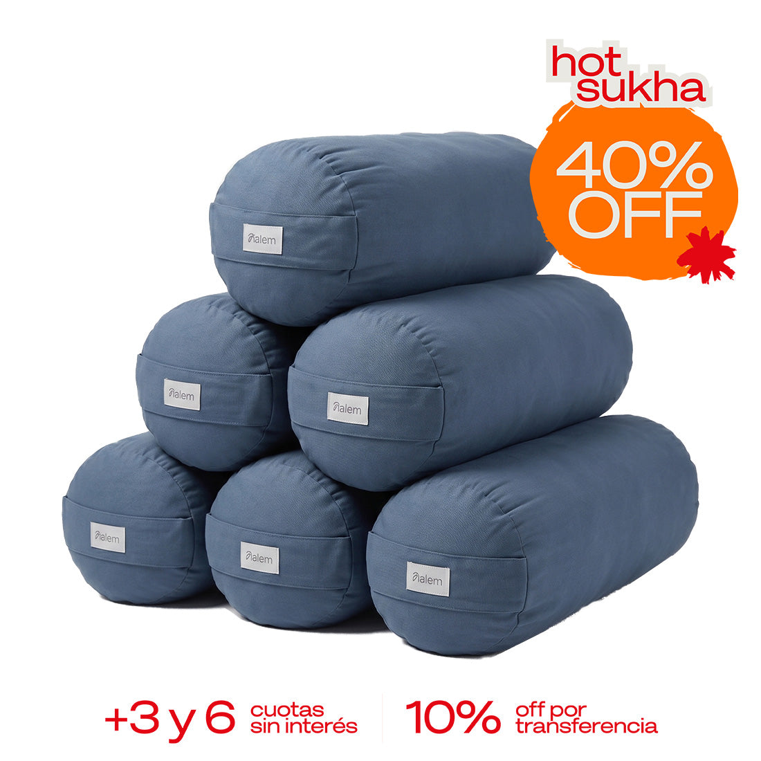 Combo de 6 bolster redondo relleno de estopa de Sukha Argentina sobre una mesa de trabajo.