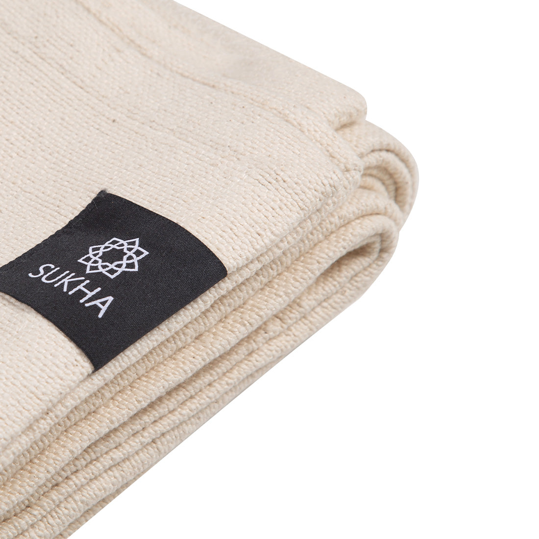 Manta Iyengar de algodón de Sukha Argentina, diseñada para yoga y relajación, en color neutro y suave textura.